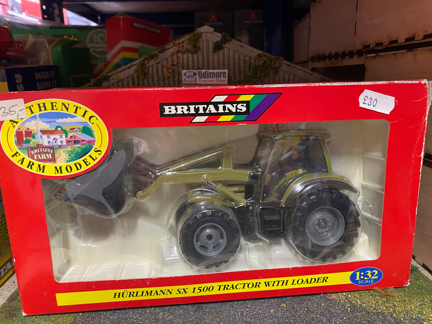 00039 Britains Hurlimann SX 1500 Tractor with loader in original  Box obsolete VINTAGE