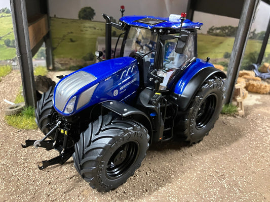 Limited Edition Marge Models New Holland Blue Power T7.340 Tractor Black wheels 1:32 scale Image