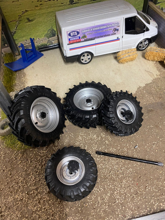 Set of 4 Silver New Holland tractor wheels tyres 1:32 scale 45mm x 17mm. 57mm x 20mm Image 2