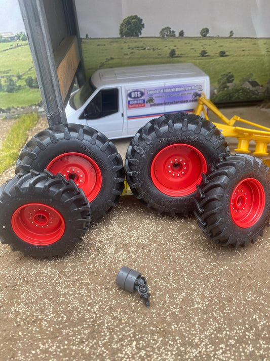 Set of 4 Trelleborg wheels 70 x 20mm. 50 x 20mm 1:32 scale Image