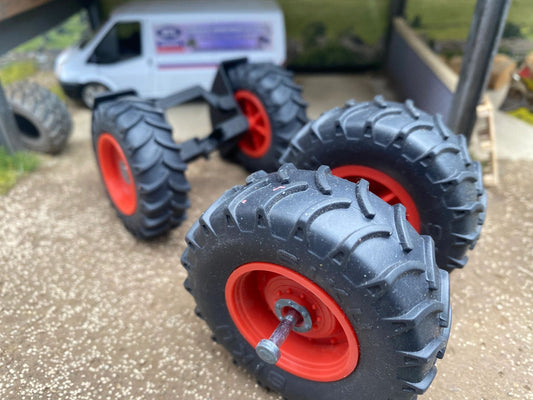 Set of 4 wheels and axles 1:32 scale Image